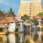 South Indian temple tank with traditional gopuram and reflections in water