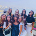 Tour group overlooking Mumbai coastline and city skyline during a guided Mumbai sightseeing tour