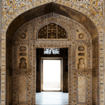 Intricate marble inlay arch inside a Mughal monument in Agra visited during a Golden Triangle