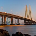 Bandra Worli Sea Link illuminated in the evening with Mumbai skyline and sea