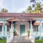 Historic Portuguese fort in Goa overlooking rocky terrain and coastal landscape