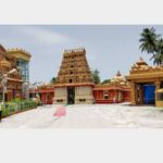 Prominent Hindu temple in Mangalore featuring an ornate golden gopuram and traditional Dravidian architecture